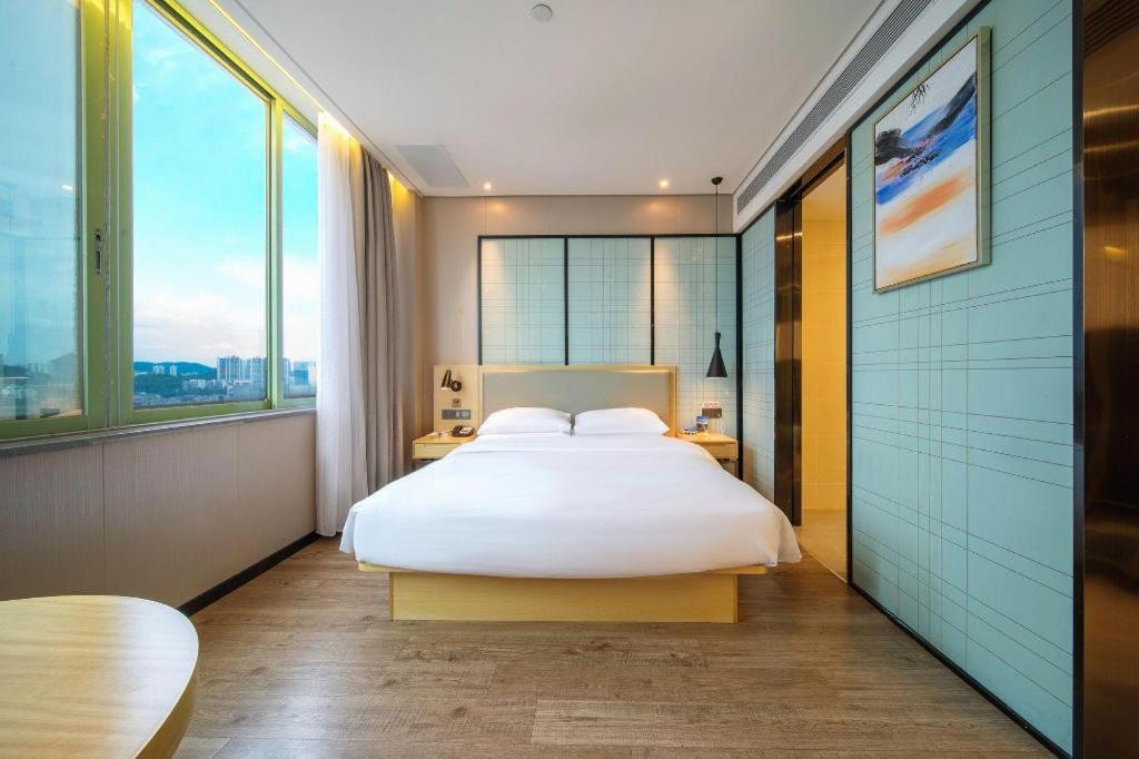 Echarm Hotel Yangjiang Baili Plaza Kültér fotó